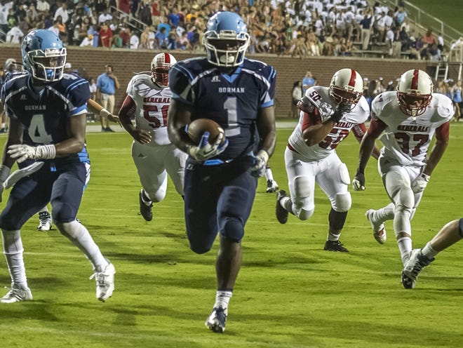 Dorman’s Shondrell Keenan (1) crosses into the end zone for a touchdown during Friday night’s win over Wade Hampton.