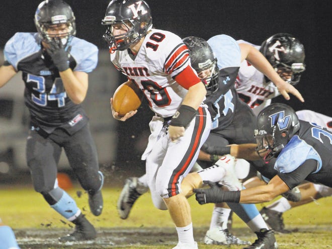 Kenny quarterback John Wolford scrambles during a Region 1-5A playoff game last year at Ponte Vedra.