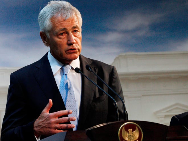 Defense Secretary Chuck Hagel said Tuesday the U.S. has "moved assets in place to be able to fulfill and comply with whatever option the president wishes to take." (Associated Press photo)