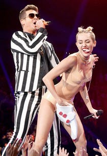 Robin Thicke, Miley Cyrus | Photo Credits: Jeff Kravitz/FilmMagic/Getty Images
