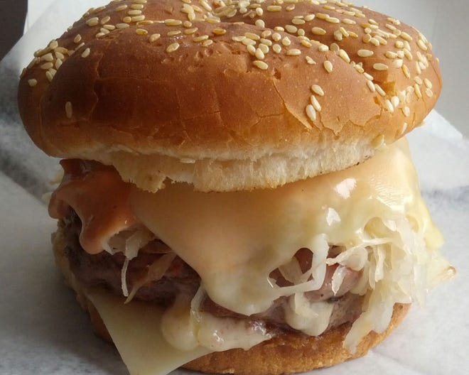 The E. Street Café Reuben Burger is inspired by the popular sandwich.