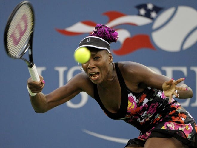 Venus Williams returns a shot to Jie Zheng, of China, during the second round of the 2013 U.S. Open tennis tournament on Wednesday.
(Kathy Kmonicek | THE ASSOCIATED PRESS)