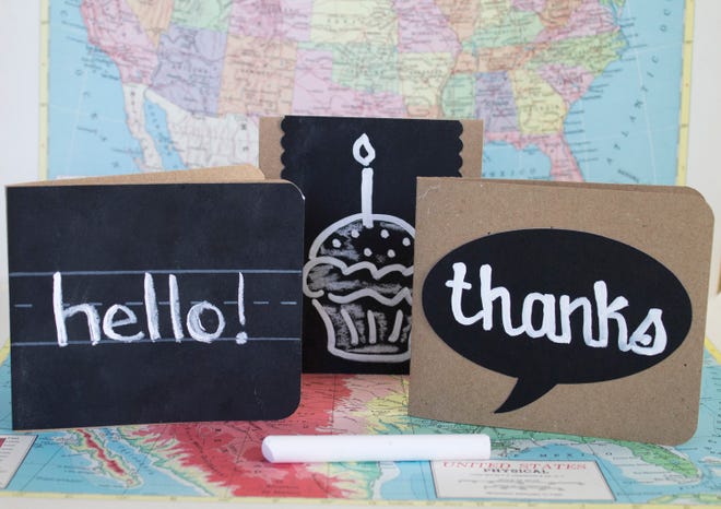 HOLLY RAMER | ASSOCIATED PRESS
Examples of handmade notecards made by spraying cardstock with chalkboard paint are shown in Concord, N.H. Get in the back-to-school mood by making
notecards that incorporate old-school elements like chalkboards, vintage maps, notebook paper and brown paper lunch sacks.