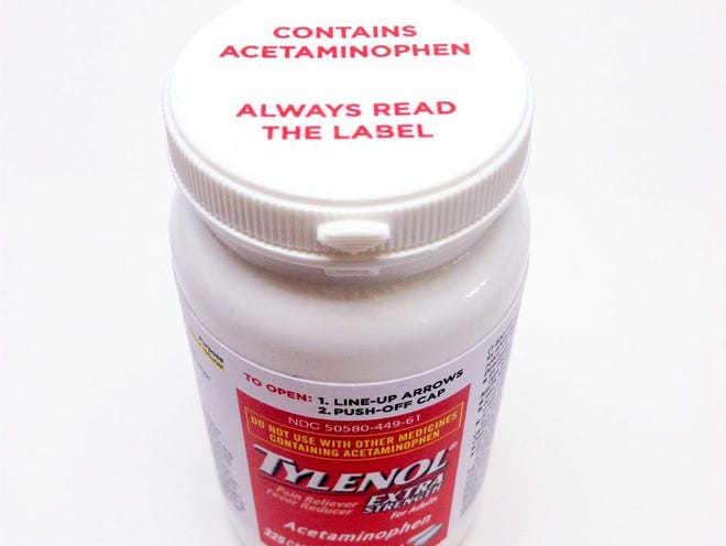 A bottle of Extra Strength Tylenol bears the new warning label on the cap alerting users to potentially fatal risks of taking too much of the pain reliever. 
(Johnson & Johnson | THE ASSOCIATED PRESS)
