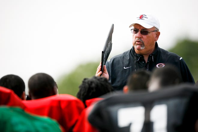 HIGH SCHOOL FOOTBALL: Generals coach Dan Burgess talks to his team after a scrimmage at U.S. Grant High School on Saturday, Aug. 13, 2011. Photo by Zach Gray, The Oklahoman ORG XMIT: KOD