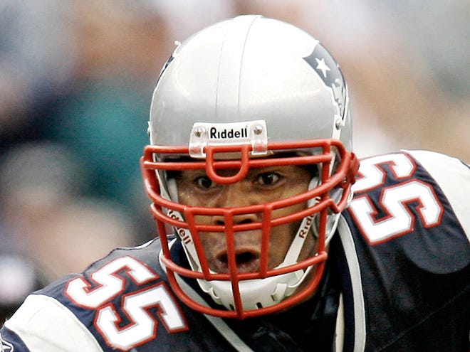 In this Oct. 7, 2007 file photo, New England Patriots linebacker Junior Seau runs with the ball after an interception. Senior U.S. District Judge Anita Brody in Philadelphia announced Thursday that the NFL and more than 4,500 former players want to settle concussion-related lawsuits for $765 million. The plaintiffs include at least 10 members of the Pro Football Hall of Fame, along with and the family of Seau, who committed suicide last year.