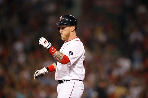Boston Red Sox's Mike Carp reacts after hitting a pinch-hit single to drive in a run against the Baltimore Orioles in the eighth inning of a baseball game at Fenway Park in Boston, Wednesday, Aug. 28, 2013. It proved to be the winning run as the Red Sox won 4-3. (AP Photo/Elise Amendola)