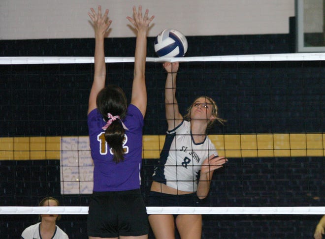 St. John's Kaycee Keller delivers a kill against Ascension Catholic last season. The Lady Eagles swept through the Brusly Westside Jamboree on Tuesday. 
POST SOUTH PHOTO/Peter Silas Pasqua