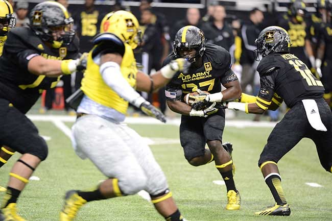 Running back Derrick Green of Richmond, Va. Hermitage High School, seen here in the 2013 All American Bowl, rushes for 48 yards on eight carries to help the East to a 15-8 victory over the West in the 2013 U.S. Army All-American Bowl on Jan. 5, at the Alamodome in San Antonio. Green is currently a freshman at the University of Alabama, which is expected by most to win it’s 3rd consecutive National Championship.