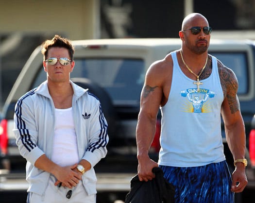Mark Wahlberg (left) and Dwayne Johnson star in "Pain & Gain."