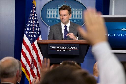 White House deputy press secretary Josh Earnest answers reporters questions in the briefing room of the White House in Washington, Thursday, Aug. 29, 2013, where he talked about Syria and the use of chemical weapons as the administration debates what action to take. (AP Photo/Jacquelyn Martin)