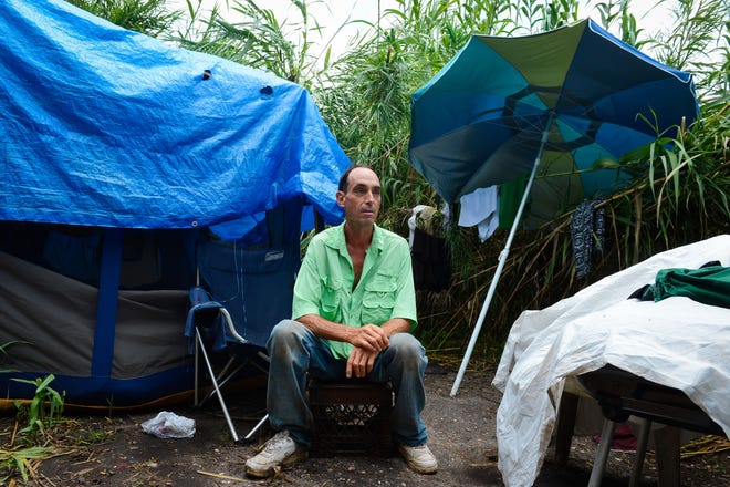 Dan, a former street sweeper from Naples who did not want his last name identified, is one of about 20 homeless people living off North Washington Boulevard in Sarasota on Friday.