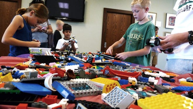 Laura’s Library hosted two Ultimate Lego Building days in August when local kids like these had a selection of thousands of Legos to build anything they could imagine.