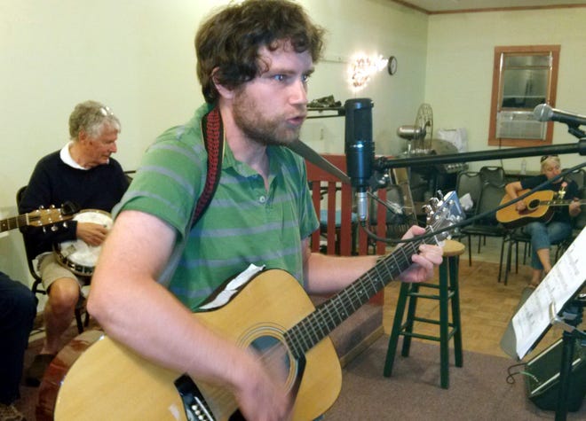 Dan Woodman sings at the Liberty Music Gathering in Milton Mills.