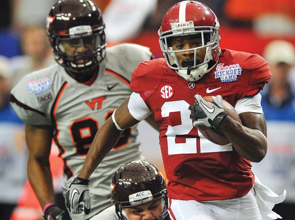 Alabama’s Christion Jones returns a punt for a touchdown against Virginia Tech on Saturday.
(Dave Hyatt | Gadsden Times)