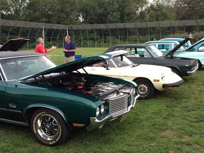 Cars line an outdoor section of the Rhode Island Training School during Monday night's car cruise.