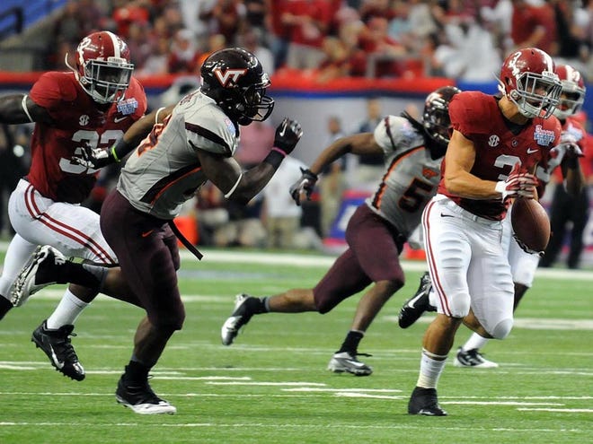 Alabama defensive back Vinnie Sunseri (3) outruns Virginia Tech running back Trey Edmunds (14) to the end zone on an interception return for a touchdown Saturday.