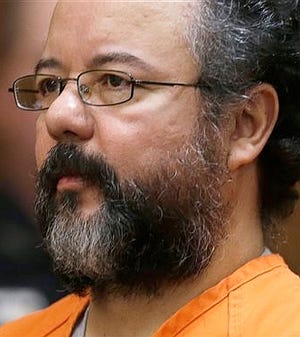 This Aug. 1, 2013 file photo shows Ariel Castro in the courtroom during the sentencing phase in Cleveland. Castro, who held 3 women captive for a decade, has committed suicide, Tuesday, Sept. 3, 2013. (AP Photo/Tony Dejak, file)