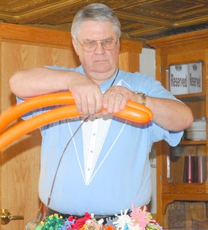 It takes balloon artist Ron Lighty, a native of Dwight, around 20 minutes to make a man and a motorcycle out of balloons. The entertainer will be bringing balloons and comedy to Meadowbrook Grade School and the Country Mansion Restaurant in Dwight this week.