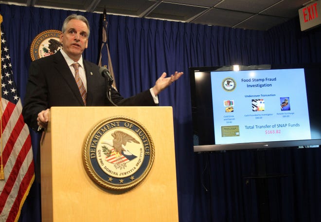 U.S. Attorney Peter Neronha describes how the fraud worked as he announces findings from a two-year investigation of food-stamp fraud at a press conference this morning at his office, in Providence.
