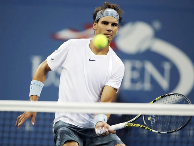 Rafael Nadal, of Spain, returns a shot to Richard Gasquet, of France, during the semifinals of the 2013 U.S. Open tennis tournament, Saturday, Sept. 7, 2013, in New York. (AP Photo/Charles Krupa)