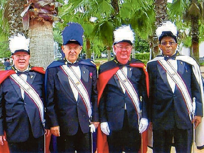 Members of an honor guard representing the Frank J. Durbin Fourth Degree Assembly recently participated in a Mass organized by the Diocese of Orlando Filipino community. From left are Jim Sharak, Tom Habina, Bob Bigg and Arnold Saunders.
PROVIDED TO THE LEDGER