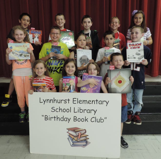 Members of the Lynnhurst Elementary School August Birthday Book Club include, back row, left to right, Nathaniel Sanchez, Seth D'Antona, Paul Webster, Christopher Benoit and Amanda Pires; middle row, left to right, Cassandra Israelson, Cameron Zabroski, Jessica Centorino-Romano, Jack Castle and Carl Finnie; front row, left to right, Lindsey Tammaro, Taylor Deleidi, Sarah Nannini and Matthew Parker.