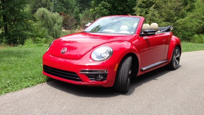 The 2013 Volkswagen Beetle Convertible Turbo screams fun and fast more than feminine and frilly.