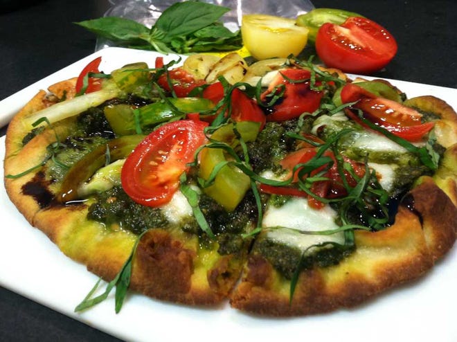 Caprese Flatbread with Chunky Basil Pesto takes advantage of the basil and tomatoes, which can easily be found in grocery stores or farmers markets this time of year.