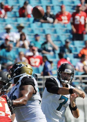 Bob.Mack@jacksonville.com --9/8/13 -- QB Chad Henne throws a completed pass to Cecil Shorts III for 24-yards to set up what they hoped would be a late TD but the Jags failed to score as the game ended in a 28-2 loss. The Jacksonville Jaguars opened their regular season against the Kansas City Chiefs on EverBank Field in Jacksonville, FL on Sunday September 8, 2013. (The Florida Times-Union, Bob Mack)