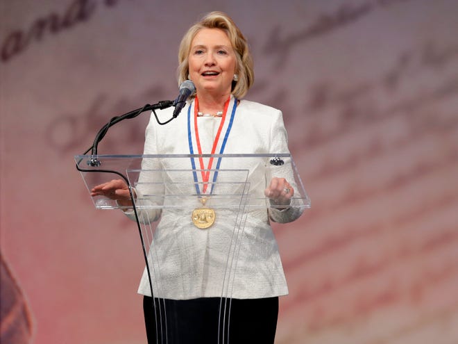 Former Secretary of State Hillary Rodham Clinton speaks after receiving the Liberty Medal during a ceremony at the National Constitution Center Tuesday in Philadelphia. The honor is given annually to an individual who displays courage and conviction while striving to secure liberty for people worldwide. (AP Photo/Matt Rourke)