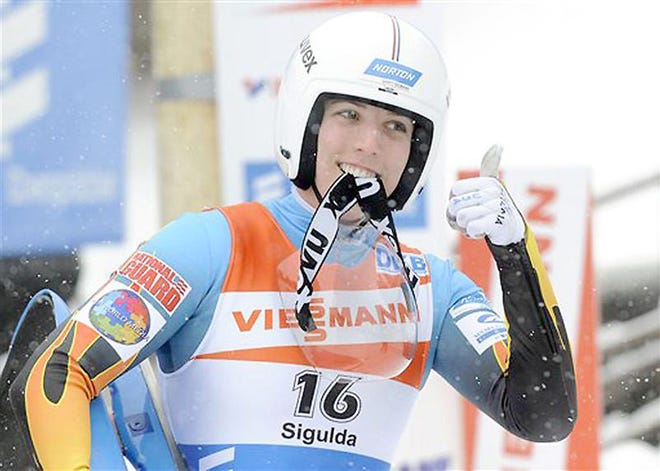 Remsen’s Erin Hamlin reacts after she placed third at an event in Latvia in 2012.



AP File Photo/Roman Koksarov