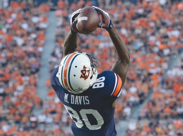 Auburn’s Marcus Davis catches his first career touchdown in last week’s game against Arkansas State. (Todd Van Emst | Auburn University)