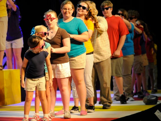 Cast members practice a number during a rehearsal of School House Rock Jr at the Ritz Theatre in Gadsden on September 10, 2013.