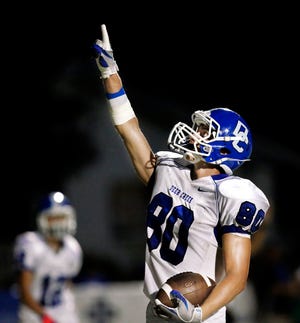 Deer Creek wide receiver Cole Verble points heavenward after crossing into the end zone, scoring the team's fourth touchdown in the first half during high school football game between the Shawnee Wolves and the Deer Creek Antlers at Harris Stadium in Shawnee, Friday night, Sep. 13, 2013.  Photo by Jim Beckel, The Oklahoman.