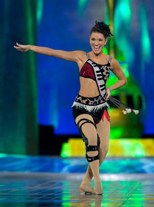 Miss Florida -- 20-year-old University of Florida telecommunications senior Myrrhanda Jones -- is shown competing in Thursday's preliminary talent competition for the Miss America pageant. She is wearing a specially made brace after earlier tearing her ACL and MCL during practice. She later won Thursday's preliminary competition, putting her in a good position to make the final group featured in Sunday's telecast on ABC. (Photo courtesy of the Miss America Organization)