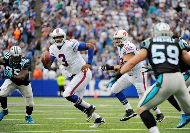 Buffalo Bills quarterback EJ Manuel (3) scrambled against the Carolina Panthers in the fourth quarter Sunday in Orchard Park, N.Y. Manuel's 2-yard touchdown pass to wide receiver Steve Johnson with two seconds remaining gave the Bills a 24-23 win. AP Photo/Gary Wiepert