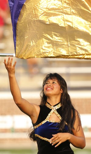 Lillian Mera performs with the band during the game between the University of Central Oklahoma Bronchos and the Pittsburg State Gorillas at Wantland Stadium.Photo by Doug Hoke, The Oklahoman DOUG HOKE - THE OKLAHOMAN
