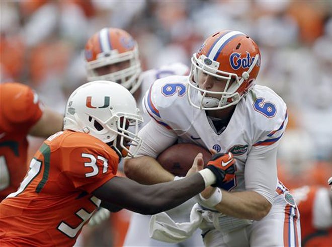 Florida coach Will Muschamp said QB Jeff Driskel has to improve on his decision-making.
