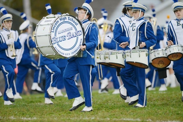 Members of the percussion section of the Lincoln High School Marching Blue Band strut their stuff at a football game at Helling Stadium in Ellwood City. The band will perform tonight at the annual Lawrence County Band Festival in New Castle.