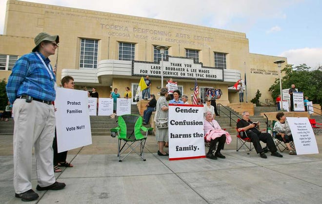 Members of the public protest Councilman Chad Manspeaker's proposed city ordinance designed to fight prejudice on the basis of sexual orientation and gender identity.