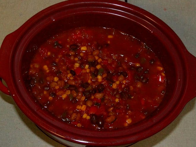 Spices  are key to dressing up this Vegetable Chili. You can also sweeten it with raisins.