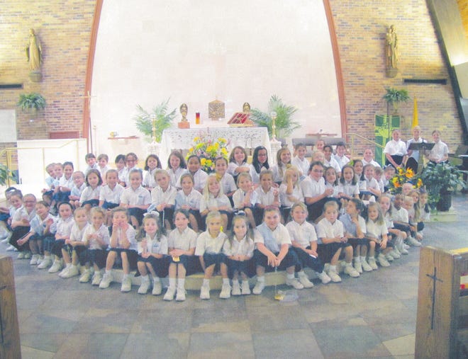 St. Genevieve Catholic Church and School's Children of Mary ministry is the largest group the church has ever had. There are 62 girls in this ministry. The Children of Mary organization is a group of girls from kindergartners through eighth-graders who honor Mary with monthly Mass, recitation of the rosary and other activities. Susie Falgoust and Beth Bourge are the group's leaders.Returning members are Reece Santiny, Andrienne Sobert, Katherine Falgoust, Mary Beth Bourge, Emma Chiasson, Olivia Chiasson, Sarah LeBlanc, Elizabeth Benoit, Elizabeth Orgeron, Cassie Thibodaux, Kennedy Breaux, Charlie-Tuyen Vu, Anna Medlen, Hannah Schexnayder, Sarah Pate, Samantha Barrios, Sasha Aulich, Maggie Escher, Helen Husbands, Ellie Lasseigne, Jenna Vicknair, Maddie Chiasson, Breanna Gros and Katherine Pate. New members are Aimee Johnson, Tyler Tauzin, Rebecca Blanchard, Emma Montgomery, Camryn Guidry, Emma Hebert, Emily Faucheaux, Karsyn Breaux, Camille DeGravelle, Emerson Hadaway, Josie Vicknair, Claire Nolan, Ellen Plaisance, Lauren Fontz, Addison Prince, Isabelle Hebert, Alaina Robertson, Gabriella Mandina, Cali Edrington, Katelyn Edrington, Emma Richard, Samantha Richard, Anabella Allemand, Katherine Powell, Juliana Allemand, Ava Wilson, Ellie Dufrene, Emma Lataxes, Sophia Barrios, Jaci Daigle, Laney Bourgeois, Jolie Naquin, Grace Lyons, Grace Fauxheaux, Blakelyn Daigle, Mia Wilson, Sydney Thibodaux and Annabelle Norwood.