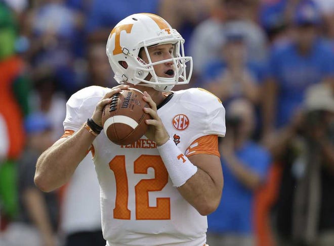 John Raoux Associated Press Tennessee quarterback Nathan Peterman looks for a receiver during the first half.