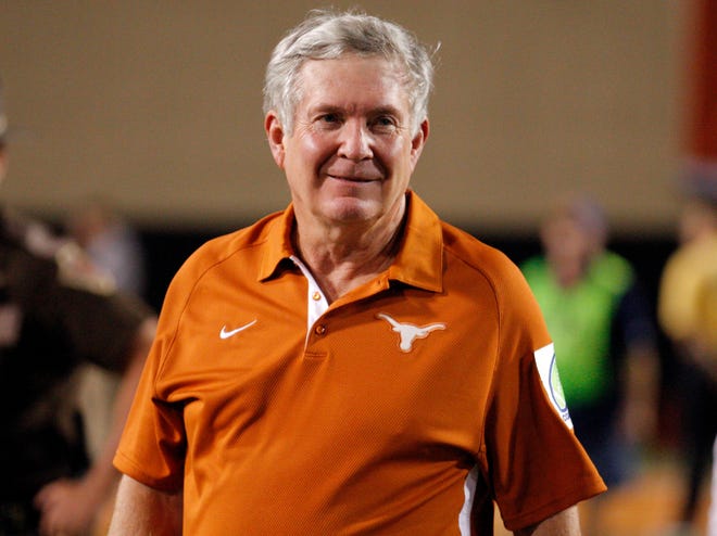 Texas coach Mack Brown waits to greet players after a college football game between Oklahoma State University (OSU) and the University of Texas (UT) at Boone Pickens Stadium in Stillwater, Okla., Saturday, Sept. 29, 2012. Texas on 41-36. Photo by Sarah Phipps, The Oklahoman