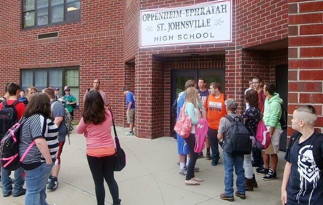 Oppenheim-Ephratah-St. Johnsville High School students gather outside of school before the start of the first day earlier this month. OESJ High School in St. Johnsville and OESJ Middle School in Oppenheim will host open house events this week. PHOTO SUBMITTED