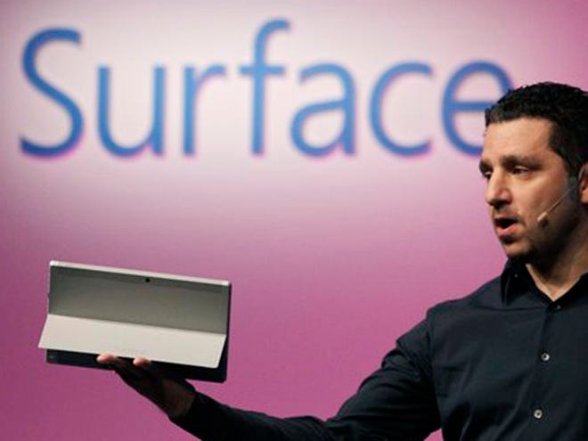 Panos Panay, corporate vice president of Microsoft, introduces a Surface 2 tablet with an integrated kickstand, Monday, Sept. 23, 2013 in New York. Microsoft says the Pro 2 also offers a 75 percent improvement in battery life over the previous model.