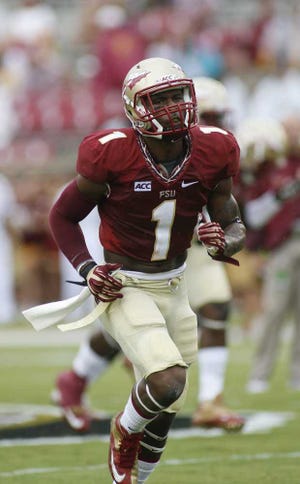 Phil Sears Associated Press FSU defensive back Tyler Hunter runs on the field before Saturday's game against Bethune.