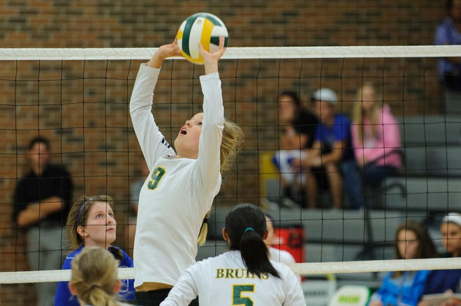 Senior setter Ali Kreklow (9) has helped the Rock Bridge volleyball team get off to a 15-1 start heading into Thursday’s home match against St. Paul Lutheran. The daughter of Wayne and Susan Kreklow — who have transformed the programs at both Columbia College and Missouri — has committed to play collegiately for her parents next year at MU.
