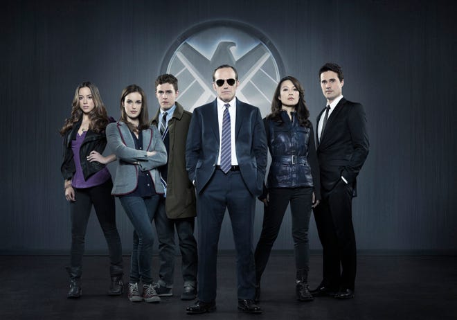 This publicity photo released by ABC shows from left, Chloe Bennet, Elizabeth Henstridge, Iain De Caestecker, Clark Gregg, Ming-Na Wen, and Brett Dalton in Marvel's "Agents of S.H.I.E.L.D," produced by ABC Studios and Marvel Television. The action franchise is off to a strong start for ABC. The Nielsen company said "Marvel's Agents" was seen by 12.2 million viewers for its debut Tuesday night, Sept. 24, 2013. ()